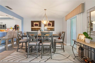 END-UNIT CONDO IN PGI W/UPDATED INTERIOR  DIRECT SAILBOAT ACCESS on Saint Andrews South Golf Club in Florida - for sale on GolfHomes.com, golf home, golf lot