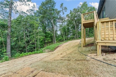 Come see this fantastic new construction home with a one year on Bella Vista Country Club - Kingswood in Arkansas - for sale on GolfHomes.com, golf home, golf lot