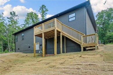Come see this fantastic new construction home with a one year on Bella Vista Country Club - Kingswood in Arkansas - for sale on GolfHomes.com, golf home, golf lot