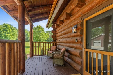 The ''Cabin'' is your opportunity to own a spacious, yet cozy on Centennial Acres Golf Club in Michigan - for sale on GolfHomes.com, golf home, golf lot