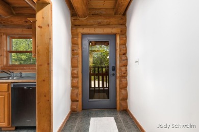 The ''Cabin'' is your opportunity to own a spacious, yet cozy on Centennial Acres Golf Club in Michigan - for sale on GolfHomes.com, golf home, golf lot