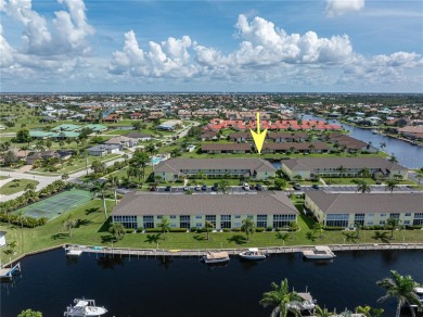 END-UNIT CONDO IN PGI W/UPDATED INTERIOR  DIRECT SAILBOAT ACCESS on Saint Andrews South Golf Club in Florida - for sale on GolfHomes.com, golf home, golf lot