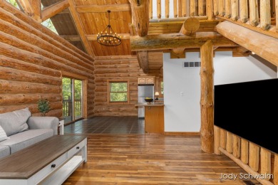 The ''Cabin'' is your opportunity to own a spacious, yet cozy on Centennial Acres Golf Club in Michigan - for sale on GolfHomes.com, golf home, golf lot