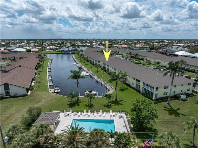 END-UNIT CONDO IN PGI W/UPDATED INTERIOR  DIRECT SAILBOAT ACCESS on Saint Andrews South Golf Club in Florida - for sale on GolfHomes.com, golf home, golf lot