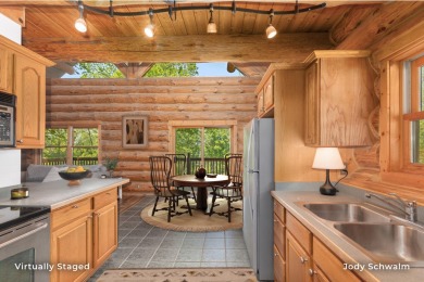 The ''Cabin'' is your opportunity to own a spacious, yet cozy on Centennial Acres Golf Club in Michigan - for sale on GolfHomes.com, golf home, golf lot