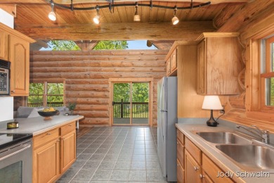 The ''Cabin'' is your opportunity to own a spacious, yet cozy on Centennial Acres Golf Club in Michigan - for sale on GolfHomes.com, golf home, golf lot