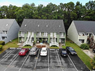 One Bedroom first floor unit at Cambridge Place in Garden City on Indian Wells Golf Course in South Carolina - for sale on GolfHomes.com, golf home, golf lot