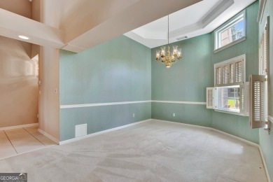 This bright, sunlit gem is situated overlooking a beautiful lake on Braelinn Golf Club in Georgia - for sale on GolfHomes.com, golf home, golf lot