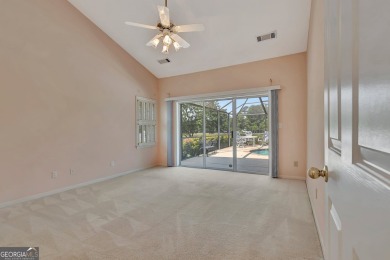 This bright, sunlit gem is situated overlooking a beautiful lake on Braelinn Golf Club in Georgia - for sale on GolfHomes.com, golf home, golf lot