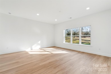 Gorgeous brand new 4 bedroom home in the lakefront golf course on Woodbridge Golf Links in North Carolina - for sale on GolfHomes.com, golf home, golf lot