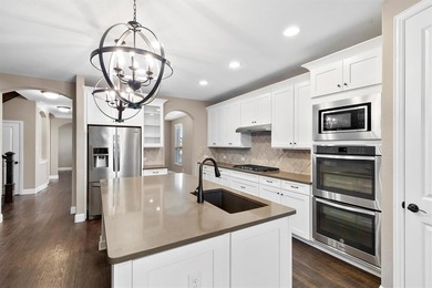 Experience living in this beautifully appointed 4bedroom, 3 on The Tribute At the Colony in Texas - for sale on GolfHomes.com, golf home, golf lot