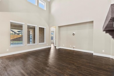 Experience living in this beautifully appointed 4bedroom, 3 on The Tribute At the Colony in Texas - for sale on GolfHomes.com, golf home, golf lot