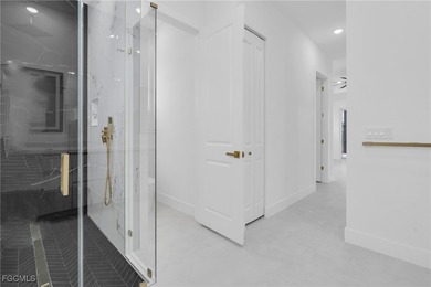 This newly built home in Port Charlotte, FL, is a luxury gem on Rotonda Golf and Country Club - Long Marsh  in Florida - for sale on GolfHomes.com, golf home, golf lot