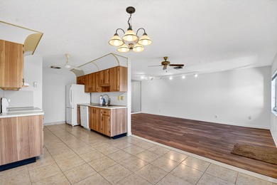 Experience stress-free, easy living in the gated Cypress Lakes on Cypress Lakes Golf Course - West Palm Beach in Florida - for sale on GolfHomes.com, golf home, golf lot