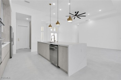 This newly built home in Port Charlotte, FL, is a luxury gem on Rotonda Golf and Country Club - Long Marsh  in Florida - for sale on GolfHomes.com, golf home, golf lot