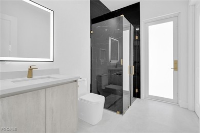 This newly built home in Port Charlotte, FL, is a luxury gem on Rotonda Golf and Country Club - Long Marsh  in Florida - for sale on GolfHomes.com, golf home, golf lot