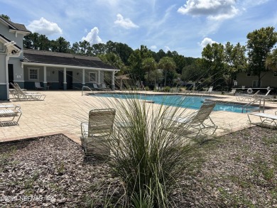 Move into this 4/2 spacious home on a quiet cul-de-sac in this on St. Johns Golf Club in Florida - for sale on GolfHomes.com, golf home, golf lot