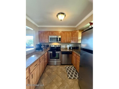 Renovated Second-Floor Furnished Condo in Golf Course on Diamondhead Country Club in Mississippi - for sale on GolfHomes.com, golf home, golf lot