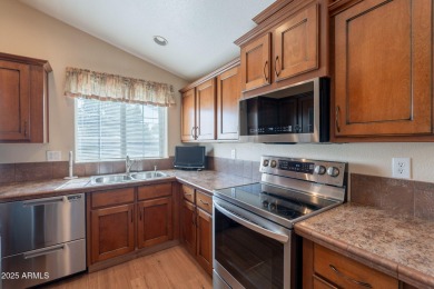Welcome to this charming & beautifully maintained 2-bedroom on Pueblo Golf Course in Arizona - for sale on GolfHomes.com, golf home, golf lot
