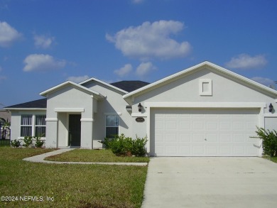 Move into this 4/2 spacious home on a quiet cul-de-sac in this on St. Johns Golf Club in Florida - for sale on GolfHomes.com, golf home, golf lot