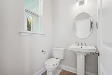 Fall in love with this 3-bedroom, 2.5-bath home with a spacious on Tidewater Golf Club and Plantation in South Carolina - for sale on GolfHomes.com, golf home, golf lot