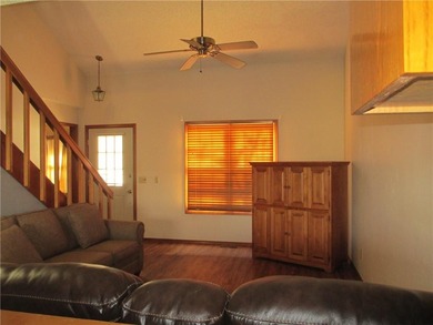 A place to stay and a place to play.  This condo offers either on Holiday Island Executive Golf Course in Arkansas - for sale on GolfHomes.com, golf home, golf lot