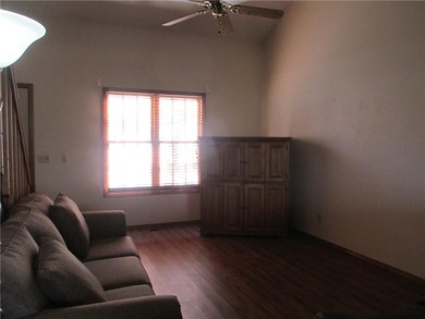 A place to stay and a place to play.  This condo offers either on Holiday Island Executive Golf Course in Arkansas - for sale on GolfHomes.com, golf home, golf lot