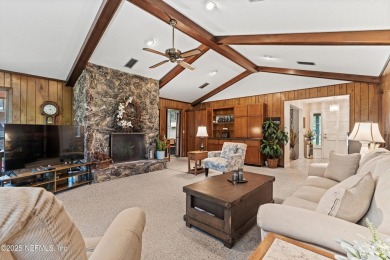 Timeless and inviting, this all-brick, one-level home is nestled on The Deerwood Country Club in Florida - for sale on GolfHomes.com, golf home, golf lot