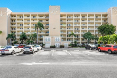 Corner waterfront unit with beautiful lakefront views.  Features on Marina Lakes Golf Course in Florida - for sale on GolfHomes.com, golf home, golf lot