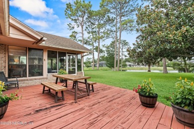 Timeless and inviting, this all-brick, one-level home is nestled on The Deerwood Country Club in Florida - for sale on GolfHomes.com, golf home, golf lot
