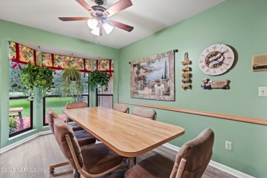 Timeless and inviting, this all-brick, one-level home is nestled on The Deerwood Country Club in Florida - for sale on GolfHomes.com, golf home, golf lot