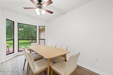 Timeless and inviting, this all-brick, one-level home is nestled on The Deerwood Country Club in Florida - for sale on GolfHomes.com, golf home, golf lot