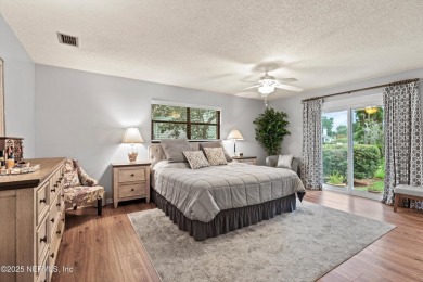 Timeless and inviting, this all-brick, one-level home is nestled on The Deerwood Country Club in Florida - for sale on GolfHomes.com, golf home, golf lot