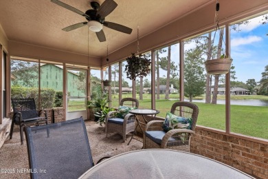 Timeless and inviting, this all-brick, one-level home is nestled on The Deerwood Country Club in Florida - for sale on GolfHomes.com, golf home, golf lot