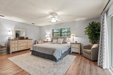 Timeless and inviting, this all-brick, one-level home is nestled on The Deerwood Country Club in Florida - for sale on GolfHomes.com, golf home, golf lot