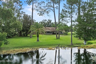 Timeless and inviting, this all-brick, one-level home is nestled on The Deerwood Country Club in Florida - for sale on GolfHomes.com, golf home, golf lot