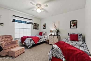 Timeless and inviting, this all-brick, one-level home is nestled on The Deerwood Country Club in Florida - for sale on GolfHomes.com, golf home, golf lot