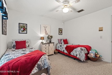 Timeless and inviting, this all-brick, one-level home is nestled on The Deerwood Country Club in Florida - for sale on GolfHomes.com, golf home, golf lot