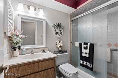 Timeless and inviting, this all-brick, one-level home is nestled on The Deerwood Country Club in Florida - for sale on GolfHomes.com, golf home, golf lot