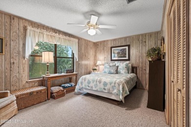 Timeless and inviting, this all-brick, one-level home is nestled on The Deerwood Country Club in Florida - for sale on GolfHomes.com, golf home, golf lot
