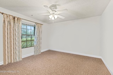 Timeless and inviting, this all-brick, one-level home is nestled on The Deerwood Country Club in Florida - for sale on GolfHomes.com, golf home, golf lot