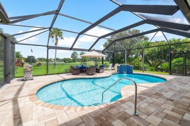 Fabulous move-in ready 5 BR + office, 4.5 BA home with pool on a on PGA National Estates Golf Course in Florida - for sale on GolfHomes.com, golf home, golf lot