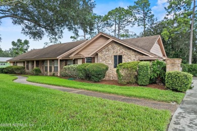 Timeless and inviting, this all-brick, one-level home is nestled on The Deerwood Country Club in Florida - for sale on GolfHomes.com, golf home, golf lot