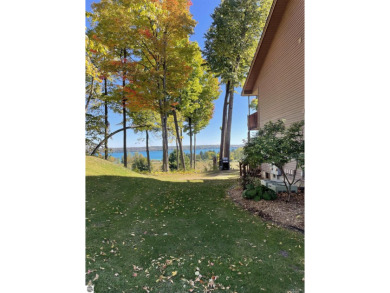 Rare opportunity to own a 3BR/3BA maintenance free condo at NW on A-Ga-Ming Golf Resort in Michigan - for sale on GolfHomes.com, golf home, golf lot