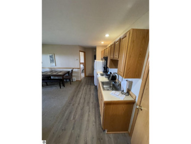 Rare opportunity to own a 3BR/3BA maintenance free condo at NW on A-Ga-Ming Golf Resort in Michigan - for sale on GolfHomes.com, golf home, golf lot