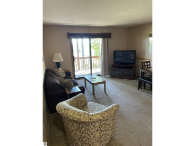 Rare opportunity to own a 3BR/3BA maintenance free condo at NW on A-Ga-Ming Golf Resort in Michigan - for sale on GolfHomes.com, golf home, golf lot