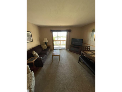 Rare opportunity to own a 3BR/3BA maintenance free condo at NW on A-Ga-Ming Golf Resort in Michigan - for sale on GolfHomes.com, golf home, golf lot