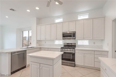 Beautifully Move-in ready spacious Grand Model features 2 on Desert Willow Golf Course in Nevada - for sale on GolfHomes.com, golf home, golf lot