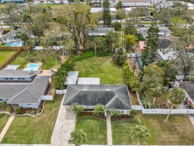 Nestled in the heart of Belleair this gorgeous home features 2 on Belleview Biltmore Golf Club in Florida - for sale on GolfHomes.com, golf home, golf lot