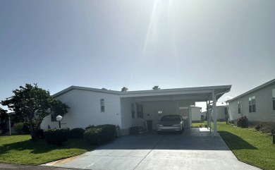 Charming 2-Bedroom Home with Sunroom in a Wonderful on Schalamar Creek Golf and Country Club in Florida - for sale on GolfHomes.com, golf home, golf lot